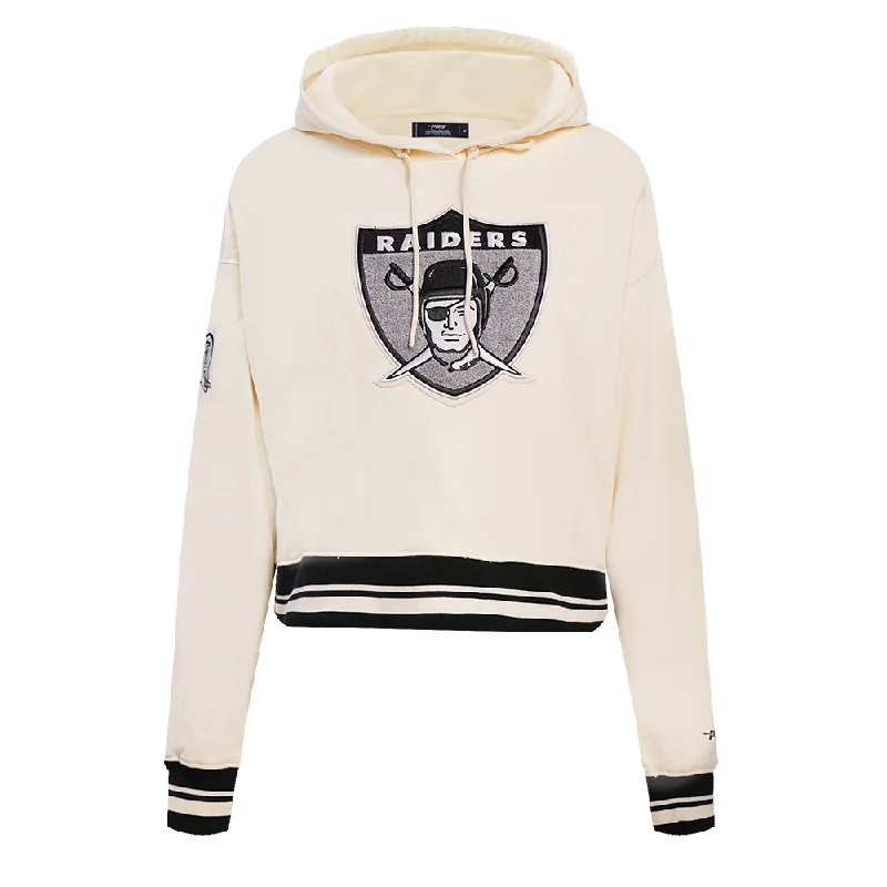 NFL OAKLAND RAIDERS RETRO CLASSIC WOMEN'S CROPPED PO HOODIE (EGGSHELL/ BLACK) Hoodie with Side Slits Relaxed Casual NFL OAKLAND RAIDERS RETRO CLASSIC WOMEN'S CROPPED PO HOODIE (EGGSHELL/ BLACK) Hoodie with Side Slits Relaxed Casual