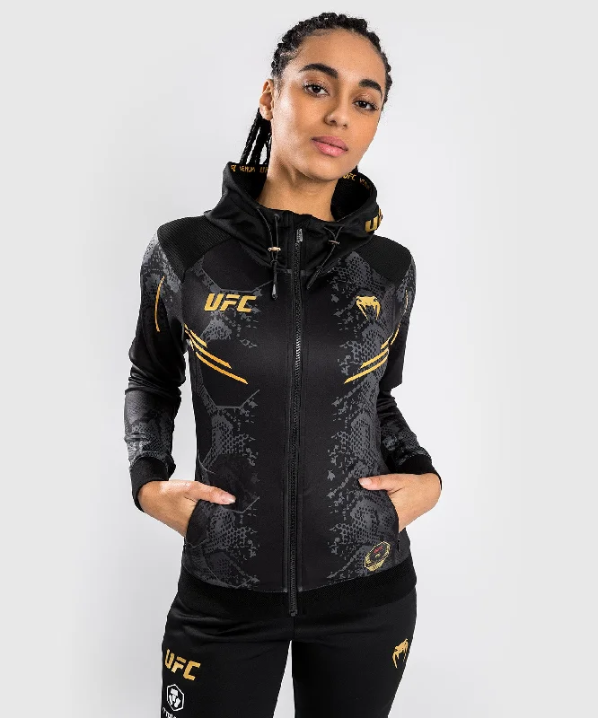 UFC Adrenaline by Venum Authentic Fight Night Women’s Walkout Hoodie - Champion Hoodie with Raglan Sleeves Sporty Comfortable UFC Adrenaline by Venum Authentic Fight Night Women’s Walkout Hoodie - Champion Hoodie with Raglan Sleeves Sporty Comfortable