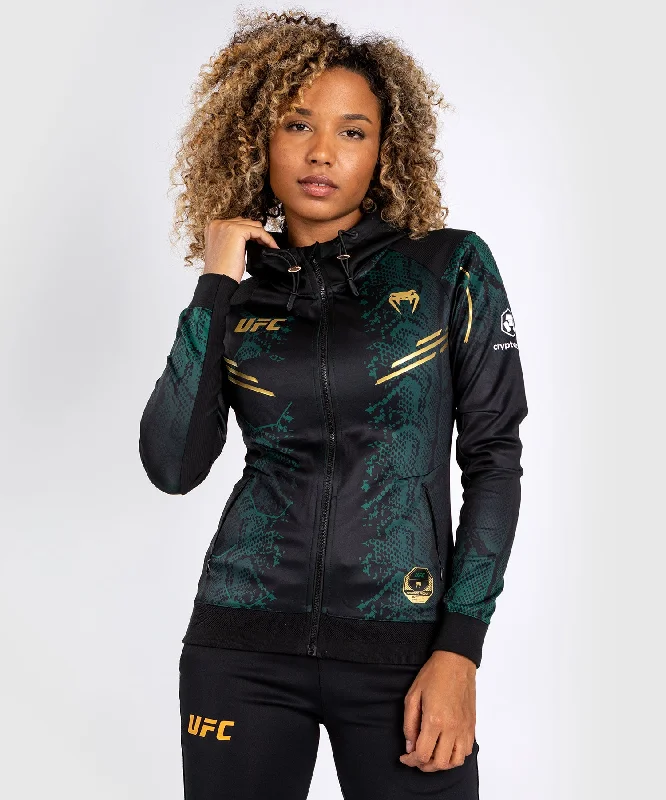 UFC Adrenaline by Venum Authentic Fight Night Women’s Walkout Hoodie - Emerald Edition - Green/Black/Gold Hoodie with Back Slit Movement Comfort UFC Adrenaline by Venum Authentic Fight Night Women’s Walkout Hoodie - Emerald Edition - Green/Black/Gold Hoodie with Back Slit Movement Comfort